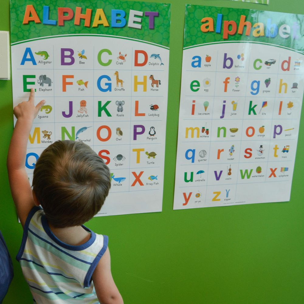 Child learning the letters