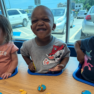 toddler making funny faces