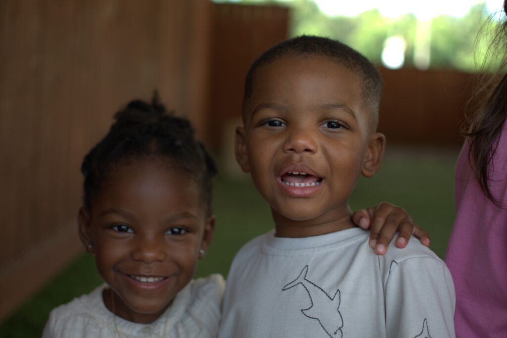 Toddlers playing outside at childcare in Magnolia